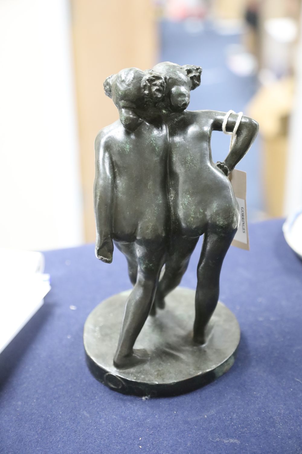 After Pierre-Auguste Renoir. A French lost wax bronze group of embracing maidens, bears signature, height 23cm